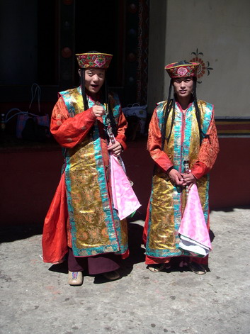 Tsechu dancers resting